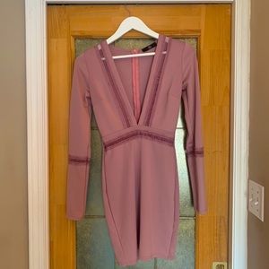 Mid length dress with plunging neckline